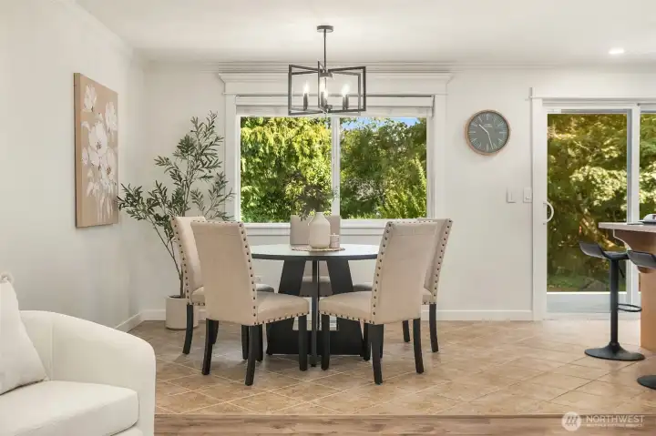 Dining Area overlooks massive deck and yard