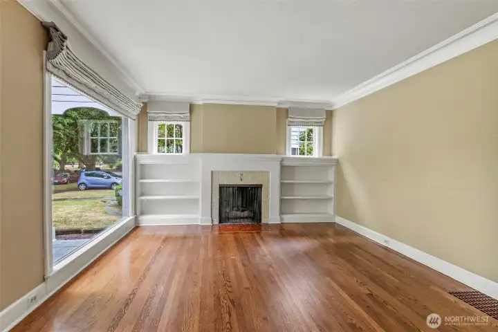 Front living room with beautiful built ins.