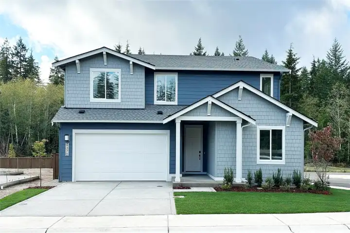 Exterior of the actual home! Beautiful 330 plan!