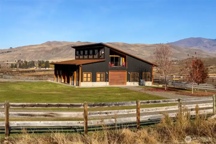 The multi-use barn has a spacious 1-bdrm apartment, yoga and exercise rooms, wine cellar and office -- and deluxe equestrian facilities, too!