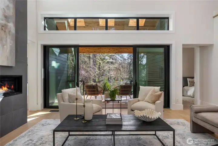 Covered back deck with skylights off of the living room