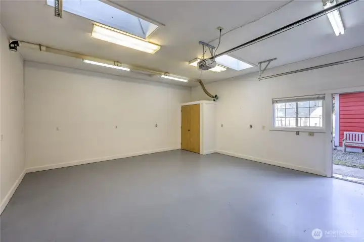 Second garage/workshop entrance near the front gate