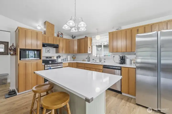 The kitchen on the right side of the entrance