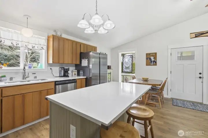 Another view of the kitchen along with the eating area