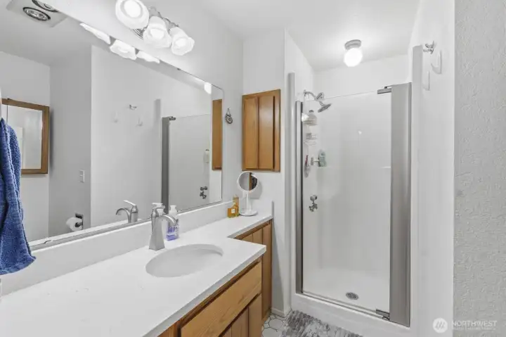 Primary bathroom with updated countertops