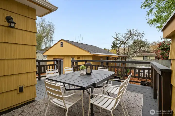 deck overlooks the fully-fenced back yard and DADU