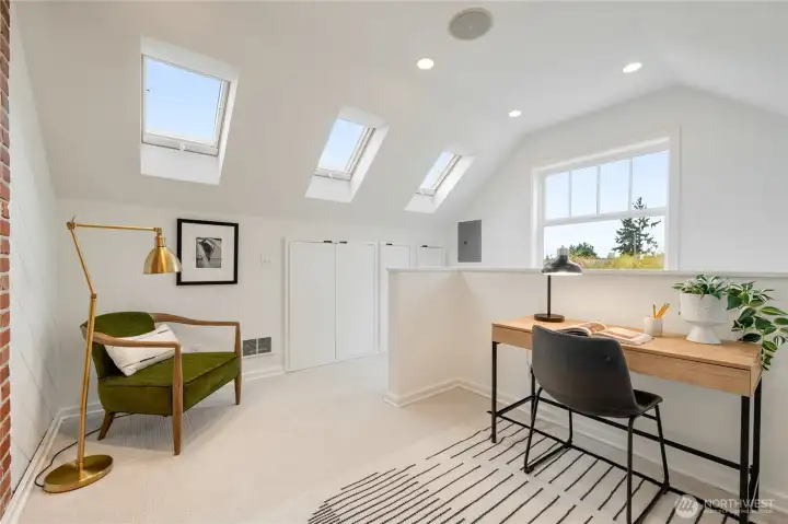 with dedicated water heaters, and plumbing in the wall, this upstairs retreat lends itself to many possibilities.