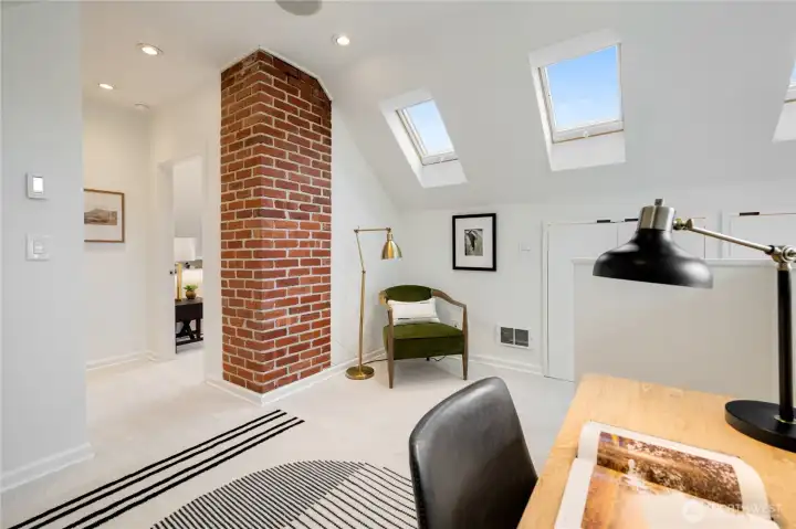 with dedicated water heaters, and plumbing in the wall, this upstairs retreat lends itself to many possibilities.