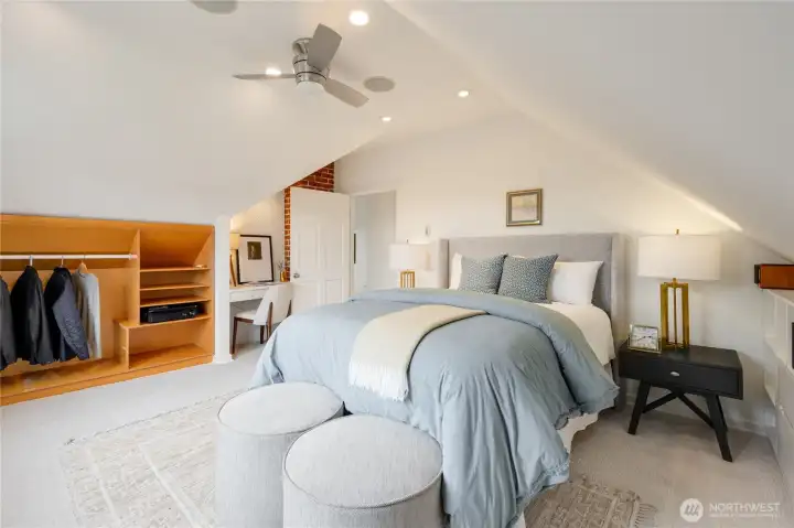 upstairs primary bedroom, with views of Mt. Rainier and the Space Needle