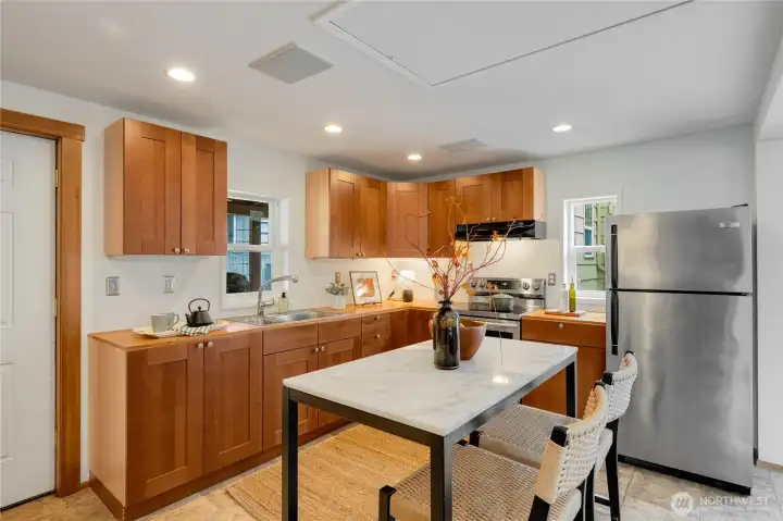 the DADU has a kitchen and a 3/4 bathrom, with dedicated laundry. How will you use this amazing space?