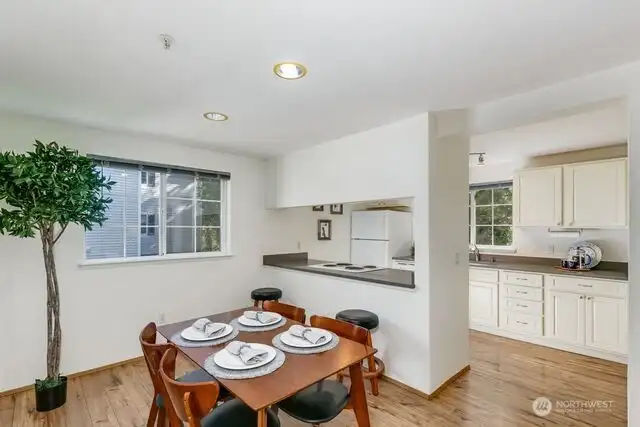 Beautiful flooring, open space between the kitchen and dining room