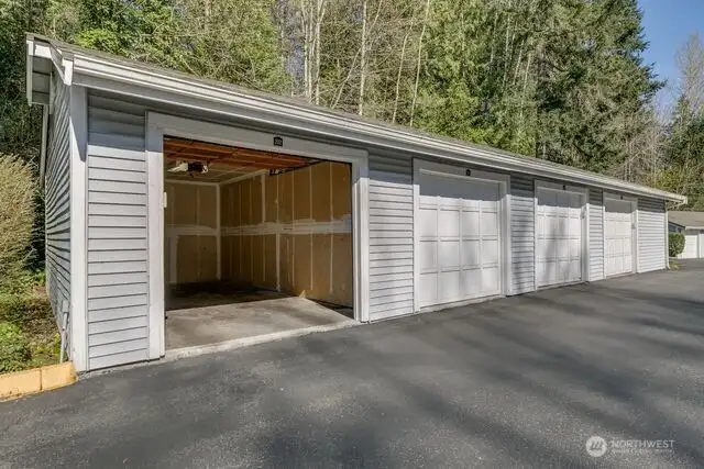 Covered single car garage with garage opener #202
