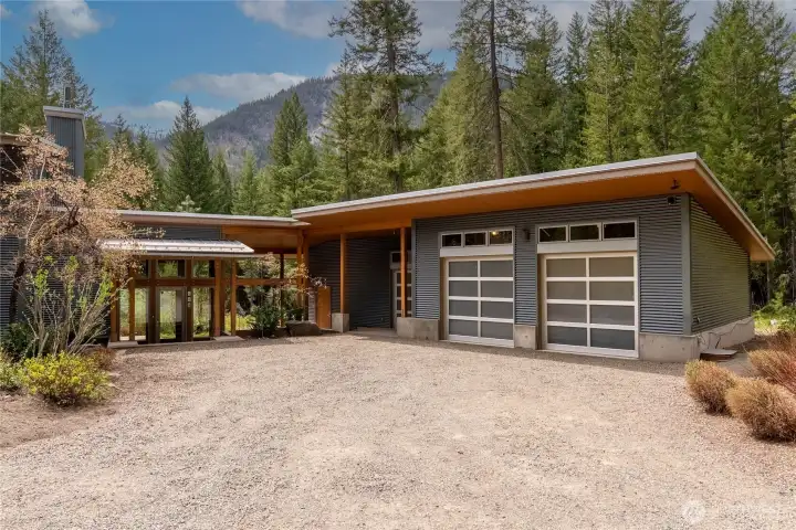 The gracious covered entry and two car garage make coming and going year round a breeze.