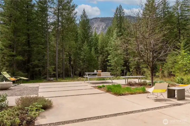 The terrace is set within a beautiful low-maintenance garden and makes for easy indoor-outdoor living.