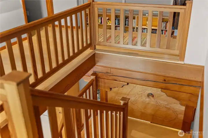 The open staircase is made of solid wood and bamboo treads.