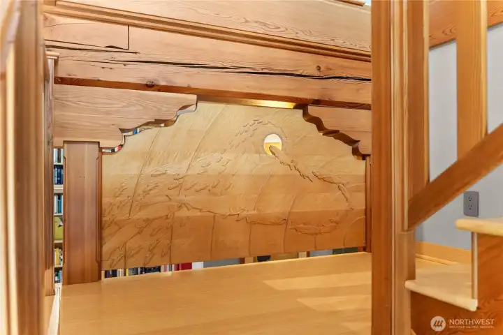 The integrated carved panel is by local Methow Valley artist, Bruce Morrison.