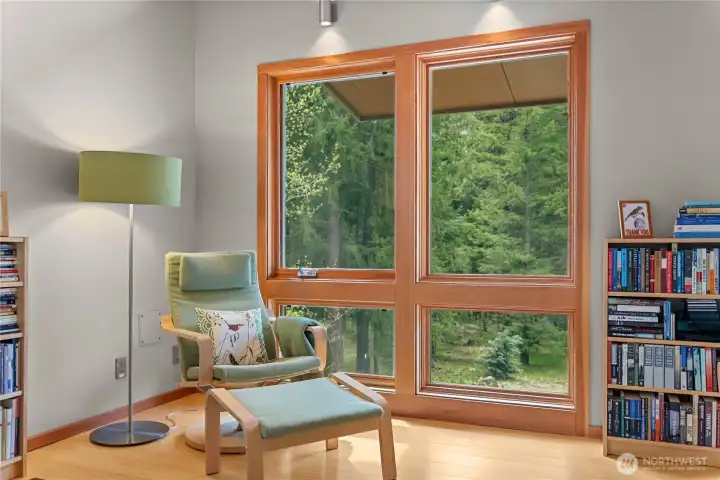 Large windows from the spacious suite look down on the garden below.