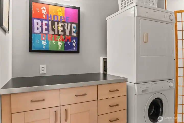 The adjacent laundry room can be closed off with a pocket door.