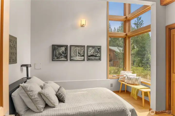 Downstairs, the guest bedroom is in a quiet corner of the house.