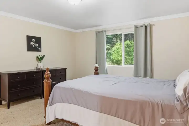 The primary bedroom features its own bathroom.