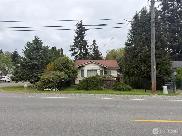 Large corner fully fenced lot.