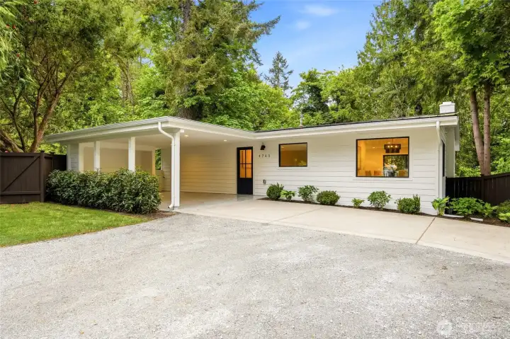 Fully renovated Bellevue retreat with fresh curb appeal, circular driveway, and a rare 20,000+ sq ft lot.
