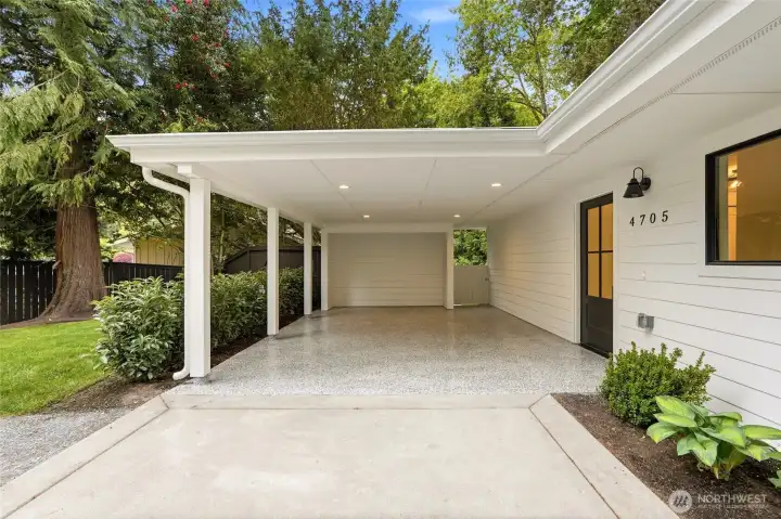 Attached 2-car carport offers covered parking and everyday convenience.