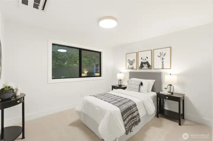 Freshly updated bedroom with new finishes, soft natural light, and a calm neutral design.