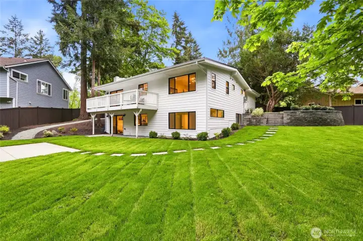 Expansive backyard setting highlights the rare 20,000+ sq ft lot and peaceful Bellevue surroundings.