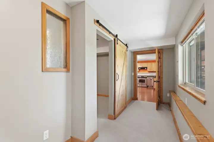 The downstairs hall takes you to...