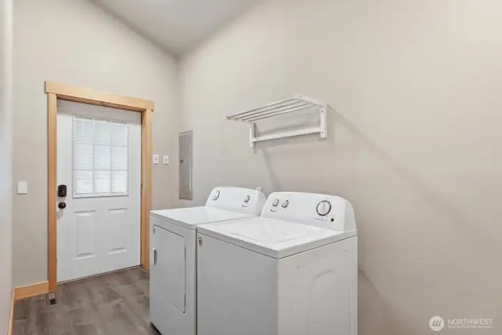 Main floor laundry room off the side entrance.