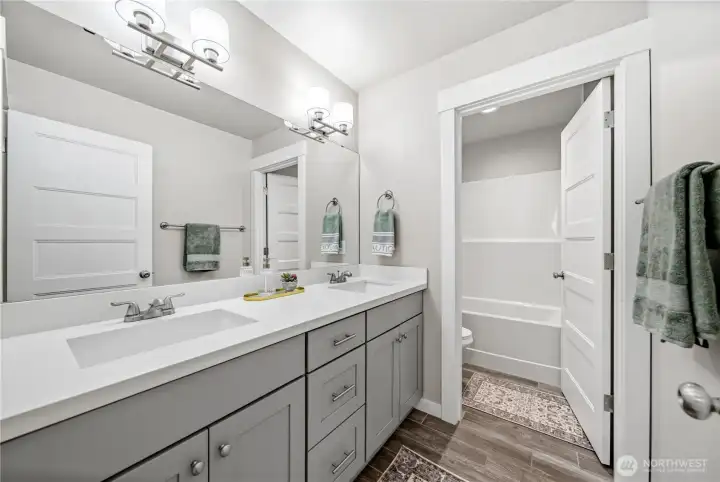 Upstairs main bathroom w/ separate tub & water closet