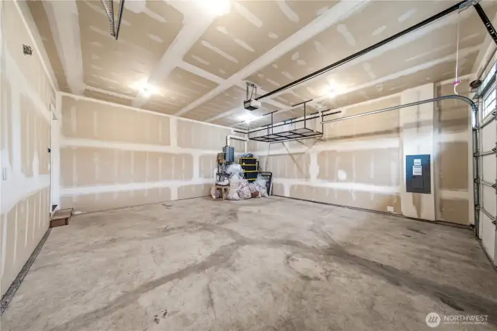 Large 2-car garage with extra space for all your tools & storage needs