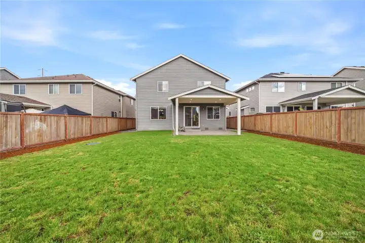 Large level backyard w/ plenty of room to play