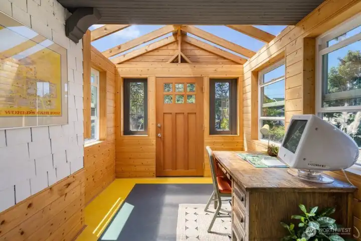 The entry makes for a great sunroom or office.