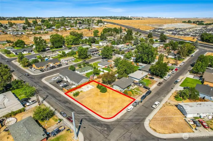 Overhead view highlighting lot boundaries and road frontage
