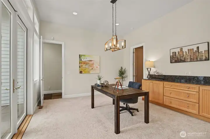 Inspired by the views of nature out your back window, this den is the perfect space to get work done. Inspired by the views of nature out your back window, this den is the perfect space to get work done.