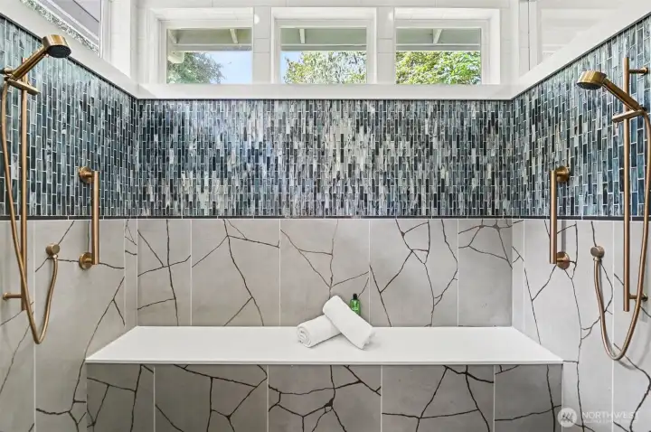 Gorgeous walk-in/roll-in primary shower with beautiful tile details Gorgeous walk-in/roll-in primary shower with beautiful tile details
