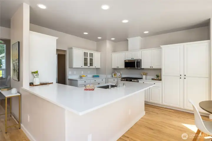 New quartz countertops and professionally painted cabinets. New quartz countertops and professionally painted cabinets.