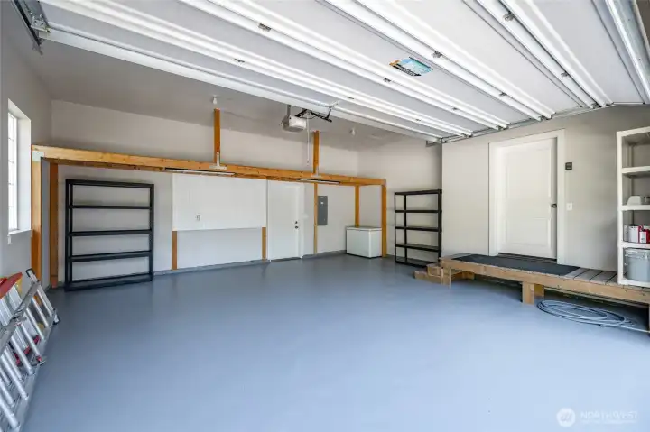 Main garage, generously sized. Main garage, generously sized.