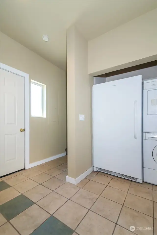 Utility room to include washer, dryer and extra fridge
