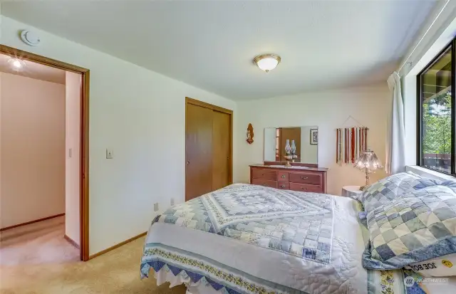 This bedroom has two closets.