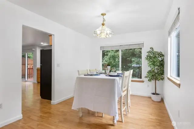 Dining room, right off the kitchen for a nice flow and easy access. Tons of natural light.