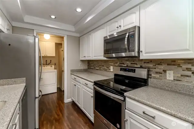 Updated kitchen with stainless appliances.