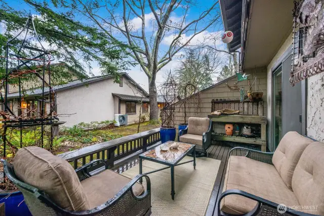 This photo of the back deck shows the lovely conversation arrangement that can be made for summer nights.