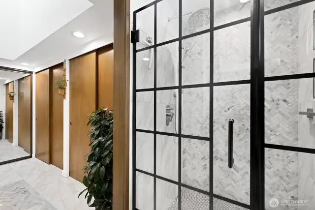 The shower is large, beautifully tiled and features a rain-forest type shower system.