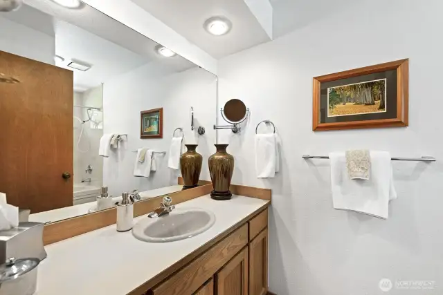 The guest room has a full bath adjacent with a tub/shower combination.