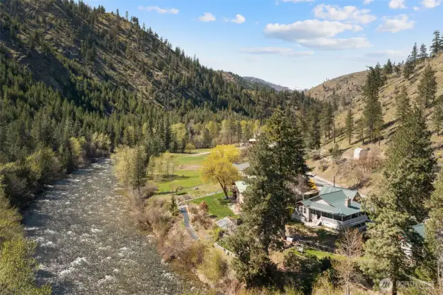 Welcome to 8831 Entiat River Road with 144' of gorgeous riverfront!