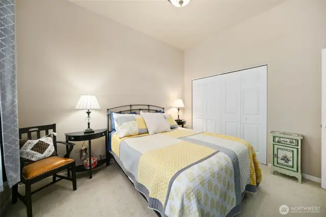 Primary bedroom with closet.