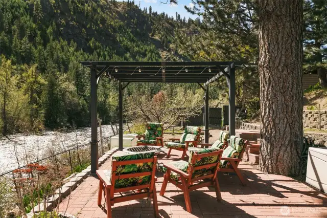 Patio & pergola over-looking the river.